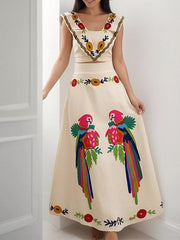 Cream embroidered crop top and maxi skirt set with parrot and floral details