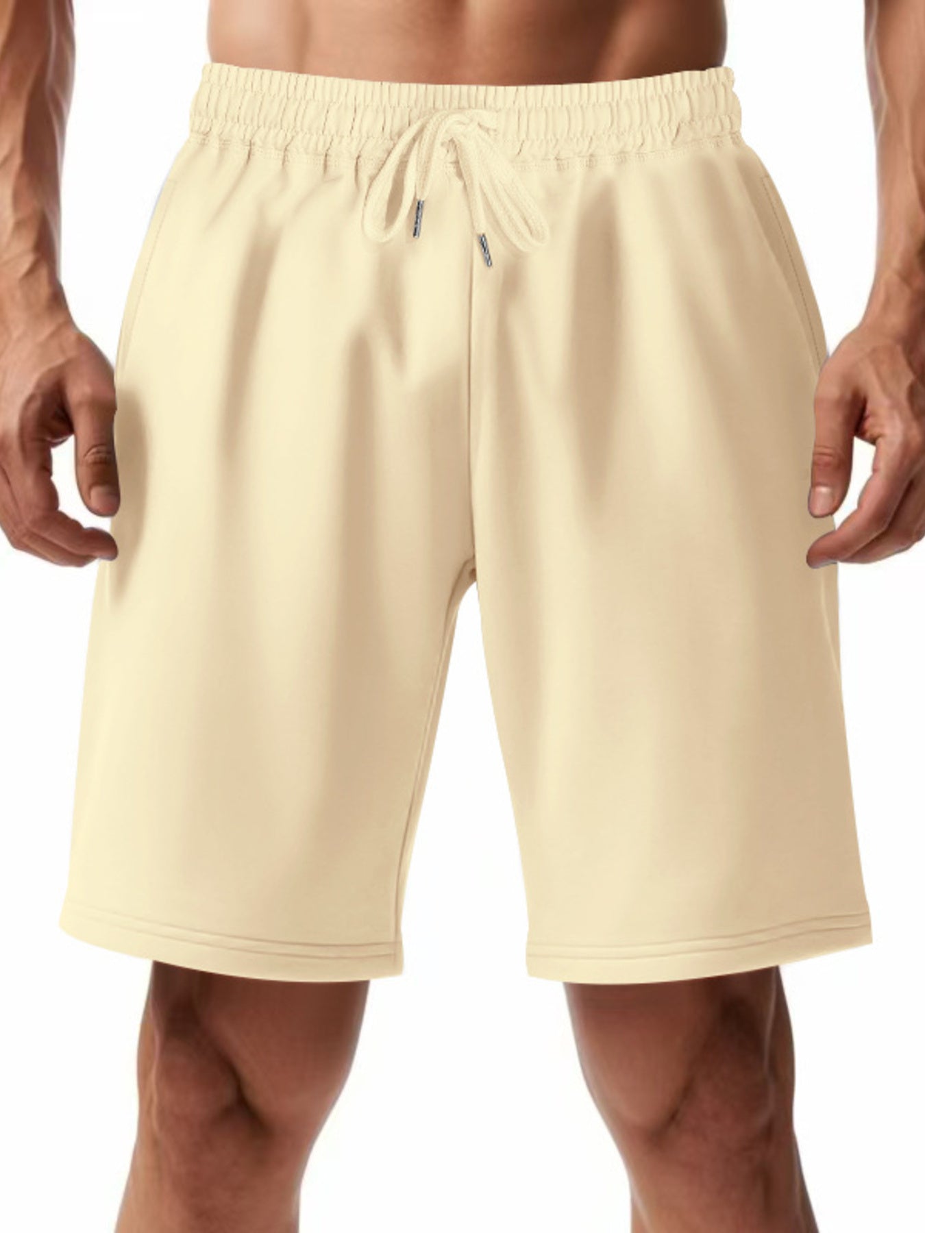 Apricot chino shorts with drawstring waist and elastic waistband.