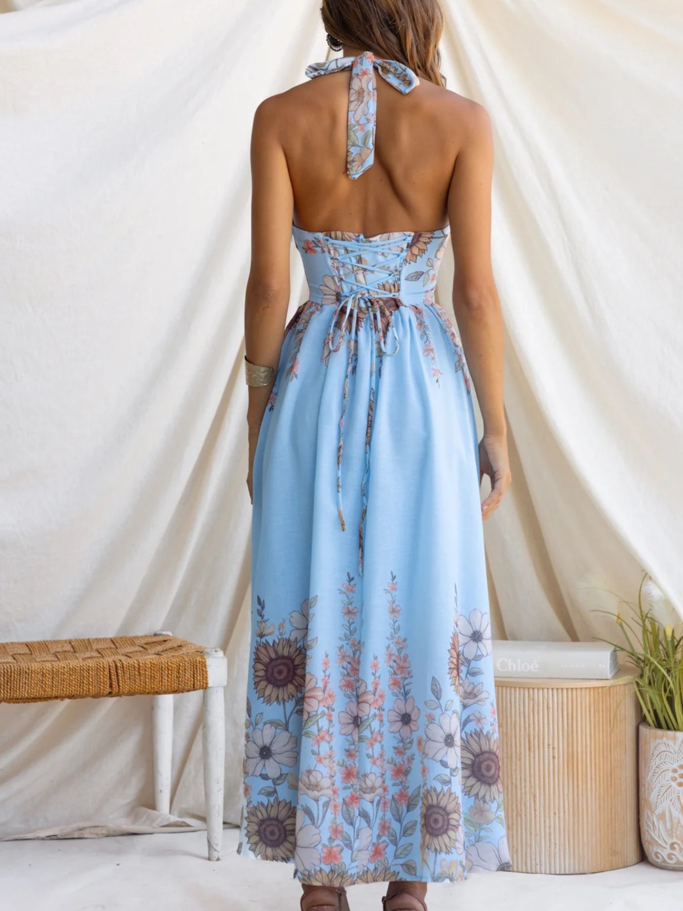 Blue floral halter neck maxi dress with lace-up back detail