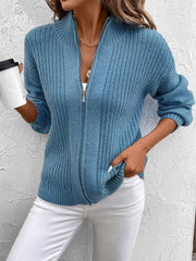 French Blue ribbed acrylic zip-up sweater with mock neck and angled back detail.