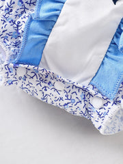 Baby one-piece in pastel blue floral print with white ruffle collar and snap closure