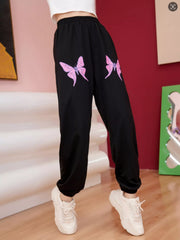 Black sweatpants with pink butterfly graphic detail