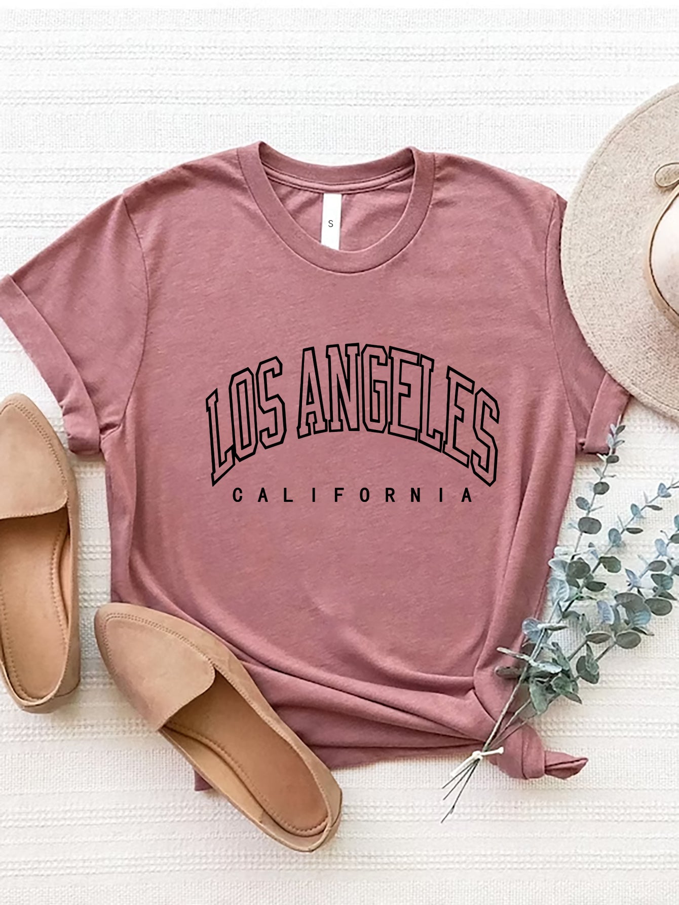 Dusty Pink graphic t-shirt with Los Angeles California text, 100% polyester
