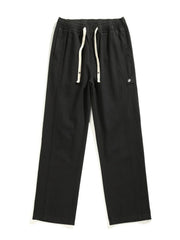 Men's black loose fit drawstring sweatpants with side pockets.