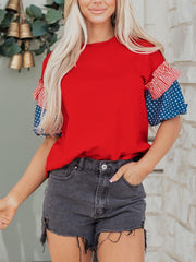 Ruffled patriotic graphic maternity t-shirt in red with star and stripe sleeves.