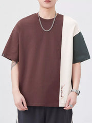 Oversized cotton t-shirt with color block design in coffee brown, cream, and dark gray.