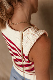 Textured stripe knit tank top with red stripes and a relaxed fit.