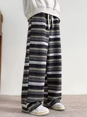 Men's wide-leg pants with drawstring and horizontal stripe pattern in gray tones.