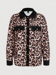 Leopard corduroy utility shirt jacket with black accents and button front.