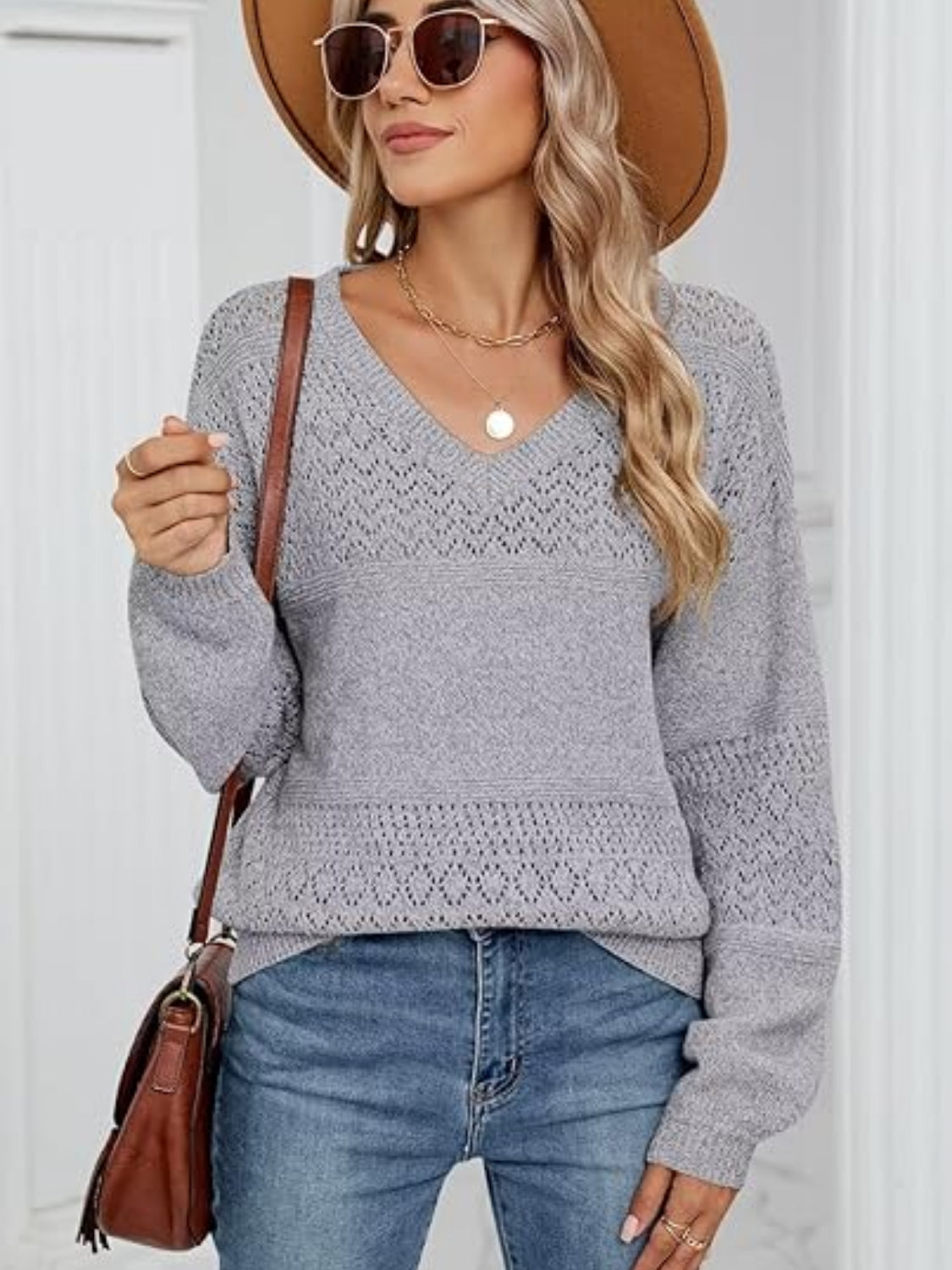 Light gray eyelet stitch V-neck pullover sweater with textured detail