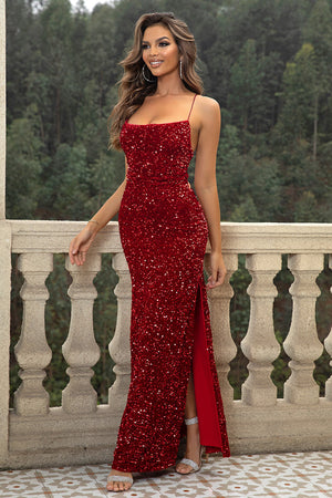Crimson sequin cami gown with backless detail and high slit.