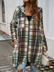 Draped plaid cocoon hoodie jacket in brown, green, and white with a zipper closure and pockets.