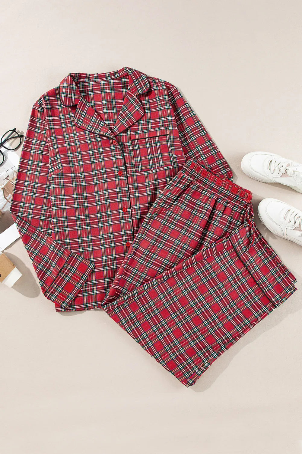 Crimson plaid relaxed fit pajama set with button-down top and elastic waist pants.