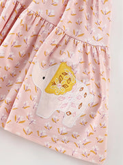 Toddler dress with pink floral print, elephant applique, and ruffle detail.