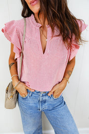 Red and white striped cotton blouse with ruffled short sleeves and a V-neck.