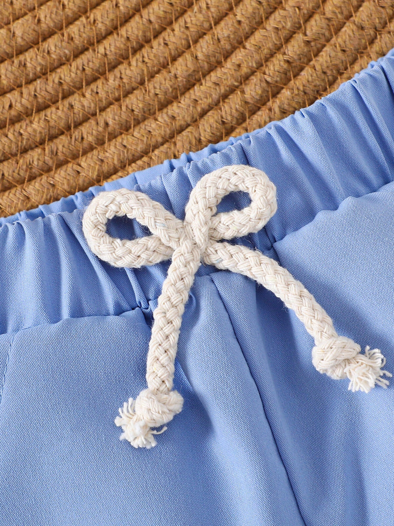 Baby blue cotton shorts with drawstring bow detail