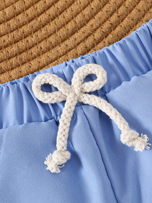 Baby blue cotton shorts with drawstring bow detail