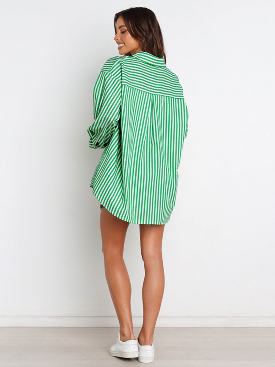 Oversized green and white striped shirting set, long sleeve button-up shirt with shorts.