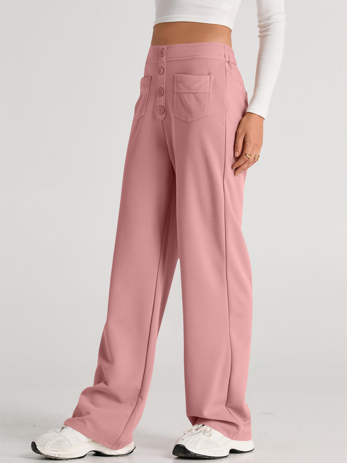 Button-front palazzo trousers in Pale Blush with wide legs and pocket details.