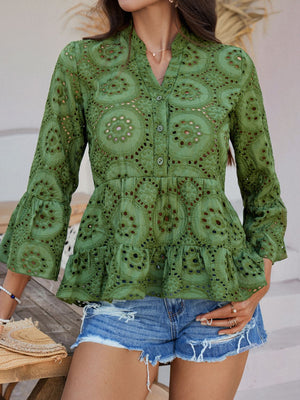 Moss green eyelet embroidered peplum blouse with ruffles and bell sleeves.