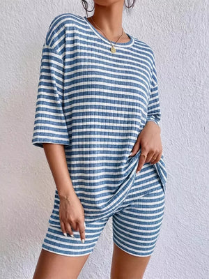 Blue striped two-piece set with elbow sleeve top and biker shorts.