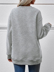Crewneck sweatshirt in charcoal with long sleeves and a relaxed fit.