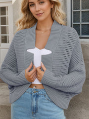 Dark gray open-knit boxy cardigan with sculpted collar and ribbed cuffs.