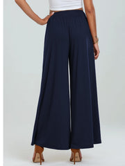 Navy elastic waist palazzo trousers with wide legs and pockets.