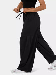 Black wide-leg jeggings with drawstring waist and pockets