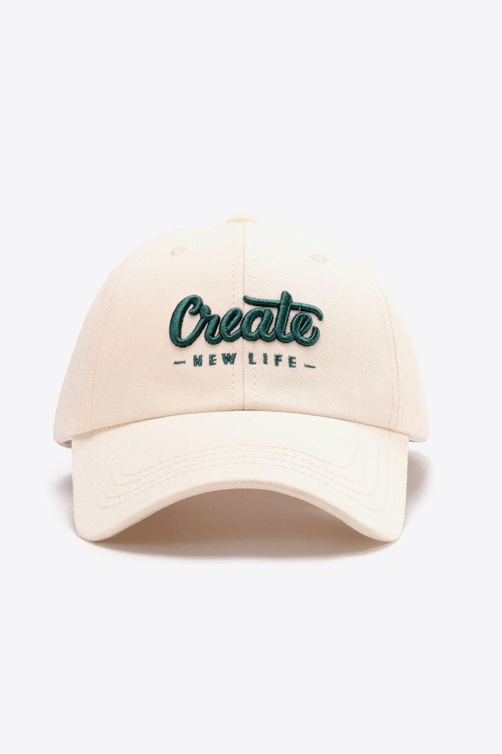 Ivory baseball cap with green embroidered "Create New Life" text