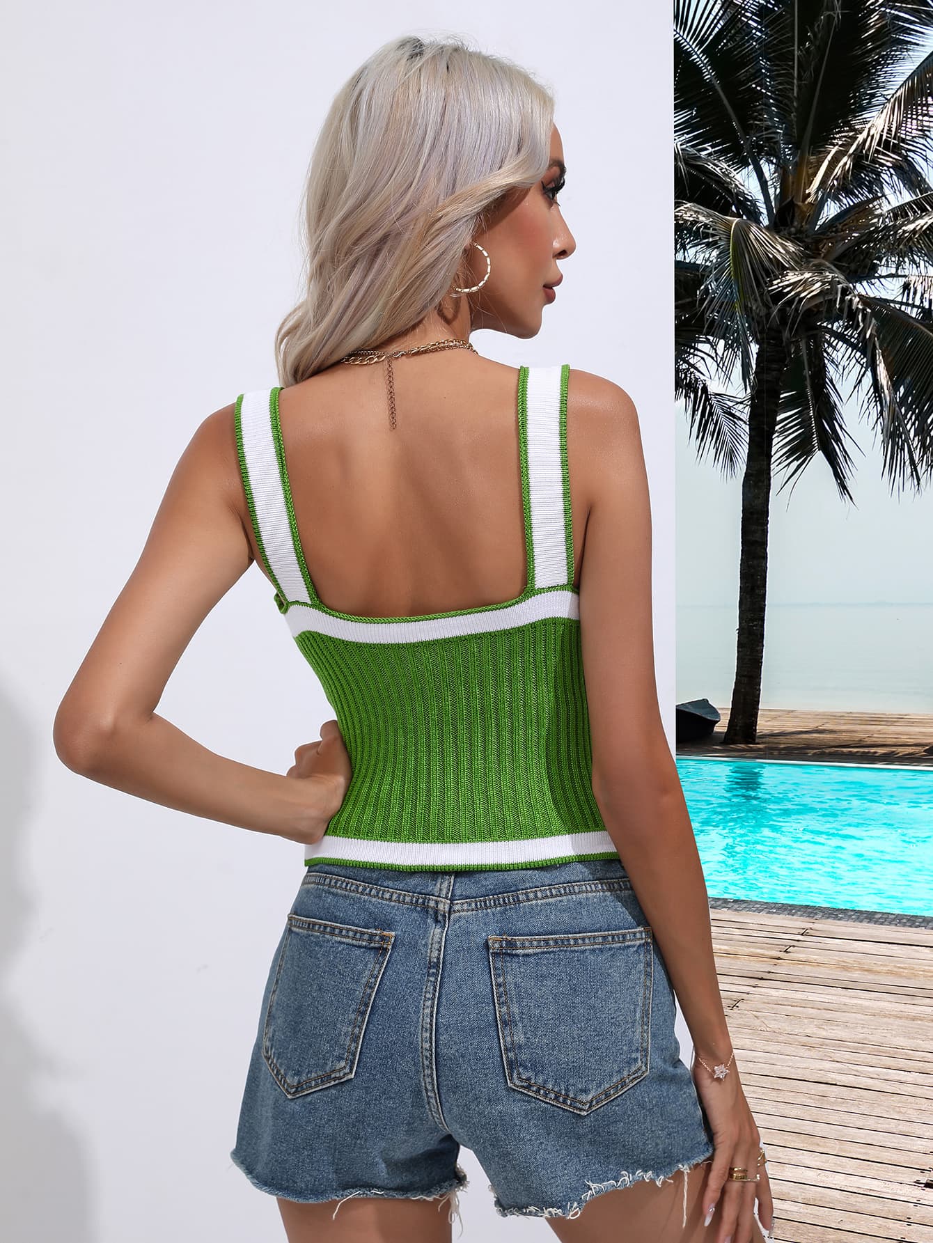 Green knit tank top with white contrast trim and square neckline.