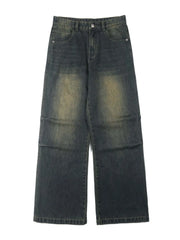 Vintage wash wide-leg men's jeans in dark blue-green cotton with a faded look.