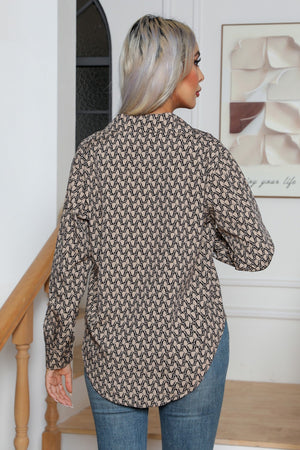 Khaki collared blouse with allover monogram print, button front, and long sleeves.