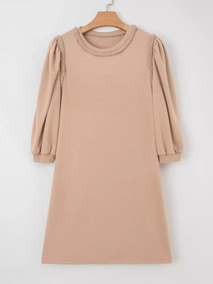 Braided puff sleeve khaki dress with crew neck and cuffed sleeves.