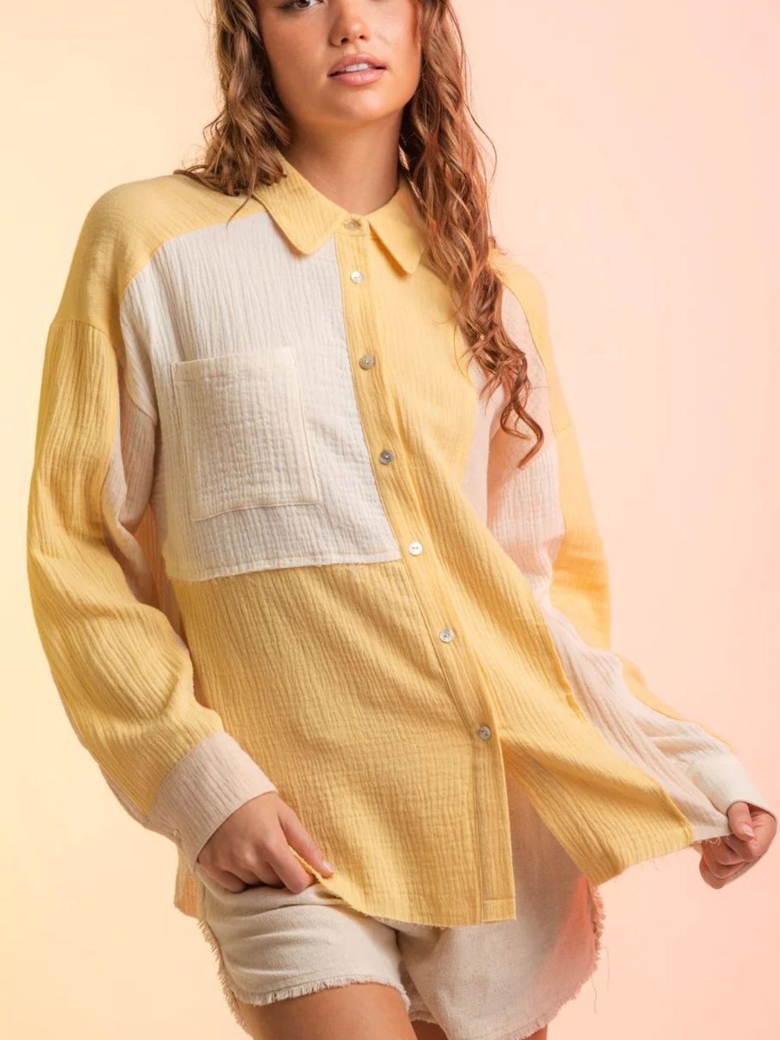 Colorblock gauze shirt jacket in yellow and cream with button front and chest pocket.