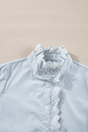 Pinstripe blouse with ruffled lace collar and button front