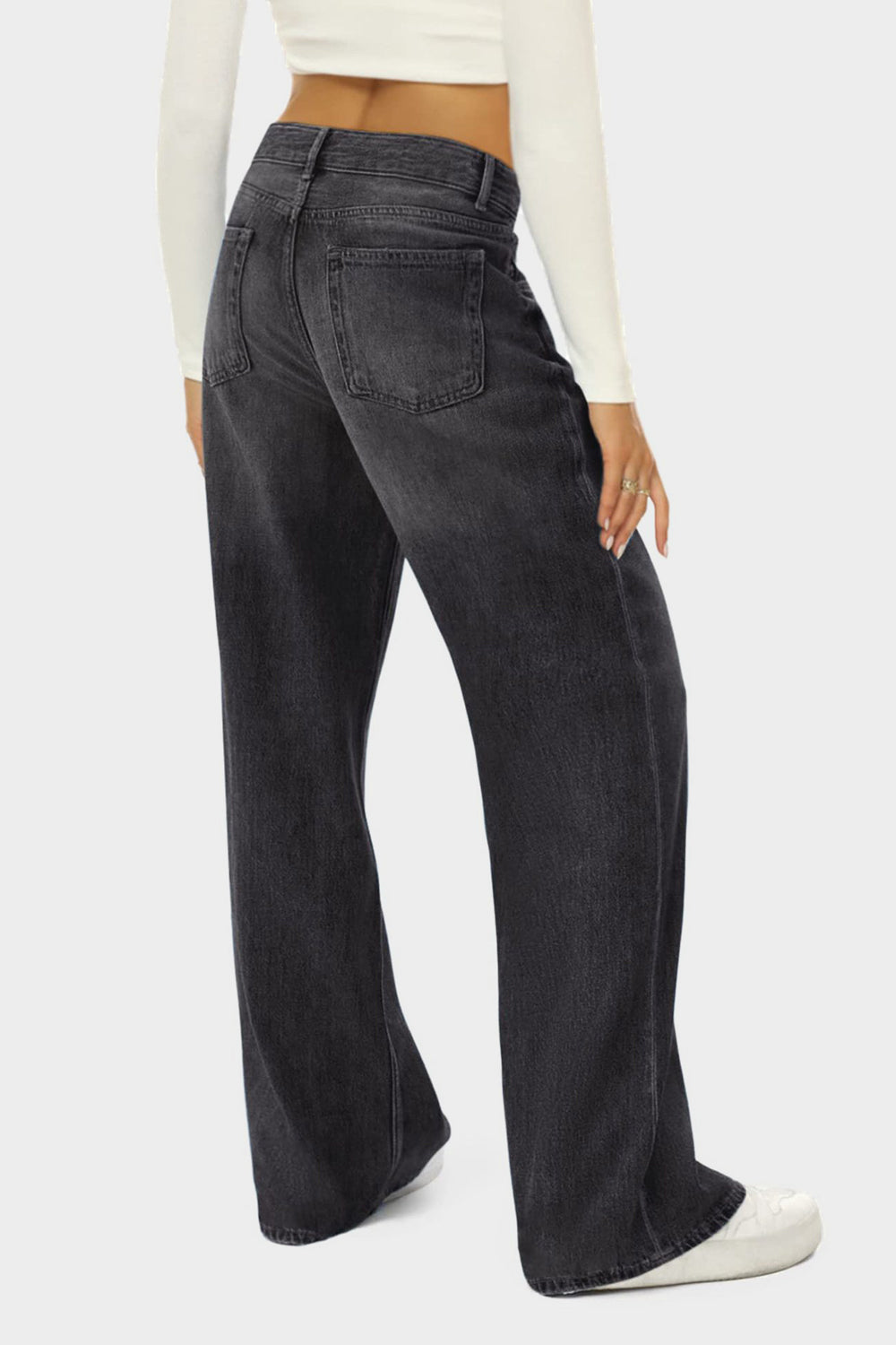 Black wide-leg denim jeans with subtle fade and button closure.