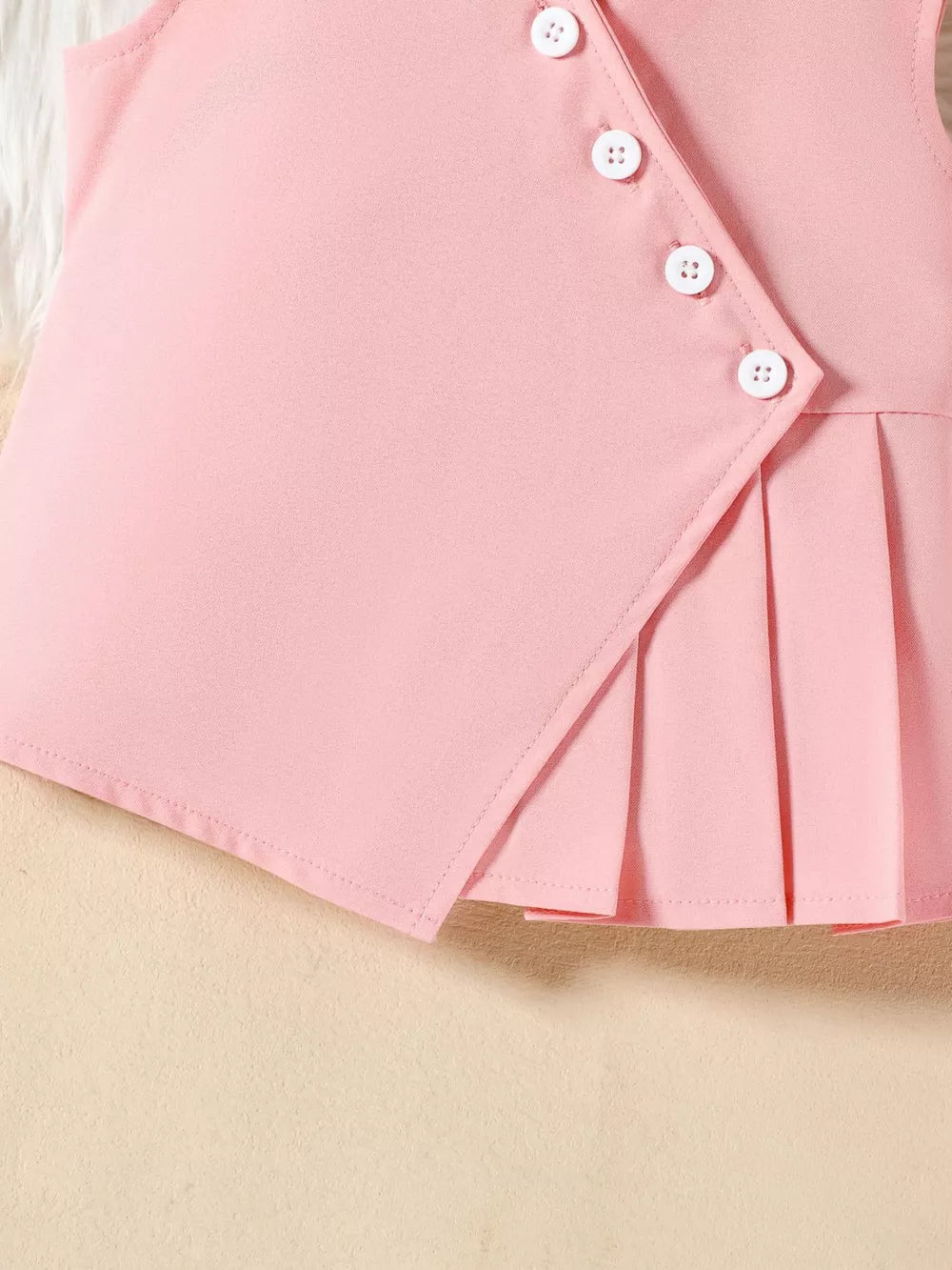 Pink baby outfit with pleated skirt and decorative buttons