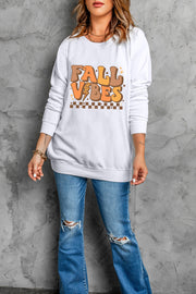White crewneck sweatshirt with "Fall Vibes" graphic, featuring retro font, leopard print lightning bolt, and checkerboard