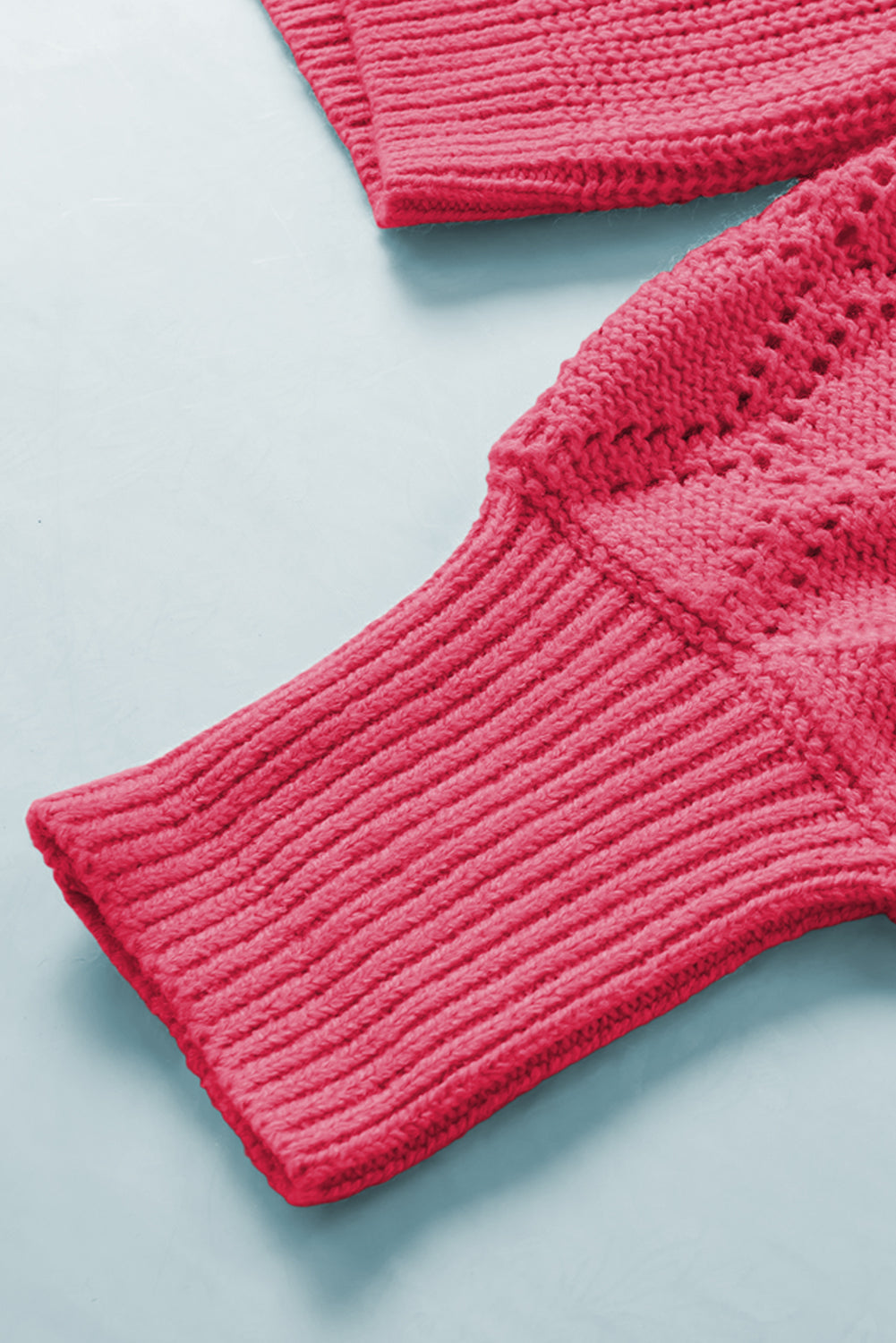 Hot Pink diamond-cut sleeve knit cardigan with ribbed cuffs and openwork detail.