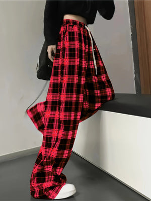 High waist wide leg pants in red and black plaid cotton with drawstring waist.