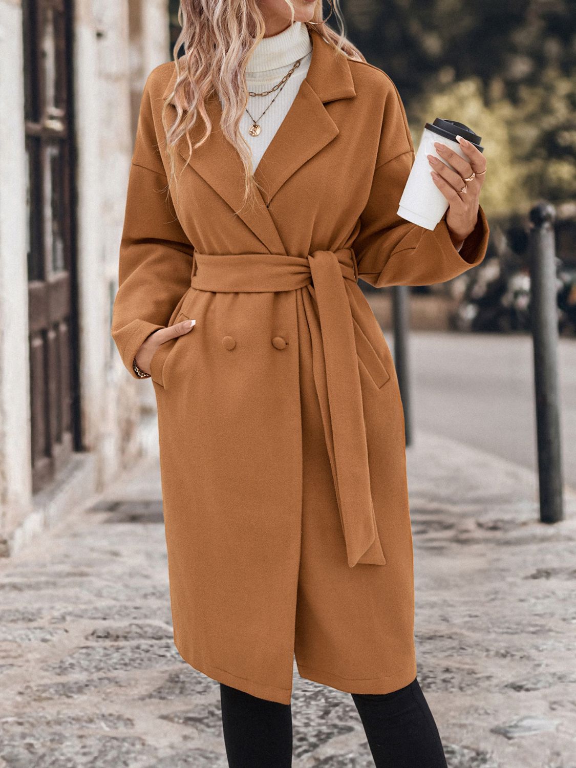 Caramel wool blend wrap coat with belt and double-breasted buttons.