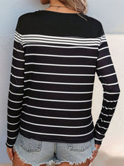 Black crew neck tee with white horizontal stripes and long sleeves