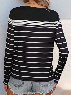 Black crew neck tee with white horizontal stripes and long sleeves