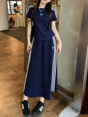 Dark blue striped tee and midi skirt ensemble with white stripe details and bow accent.