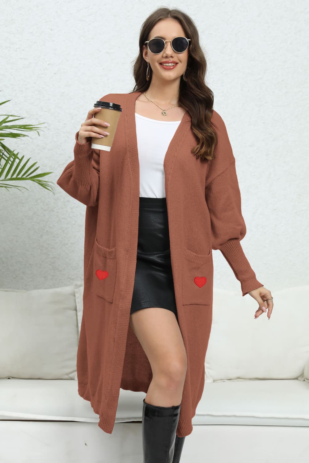 Brown long cardigan with balloon sleeves and red heart pocket details