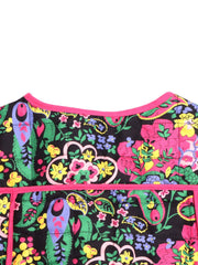 Paisley quilted jacket with bright floral print and pink trim.