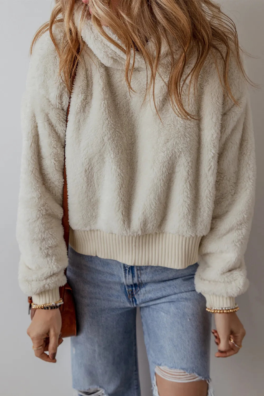 Beige plush fleece cropped hoodie with ribbed hem and cuffs