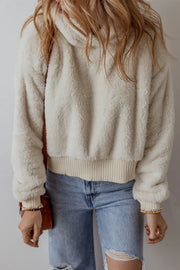 Beige plush fleece cropped hoodie with ribbed hem and cuffs