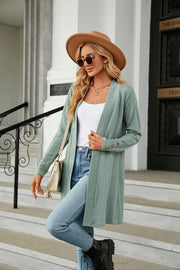 Sage textured knit open-front duster cardigan with button detail on sleeves